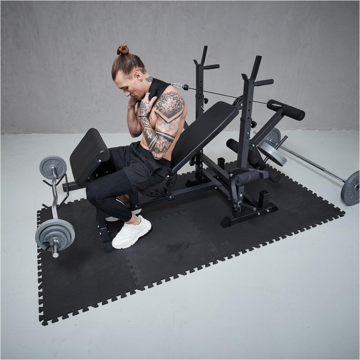 Banc de musculation universel noir avec barre de 108 kg en fonte